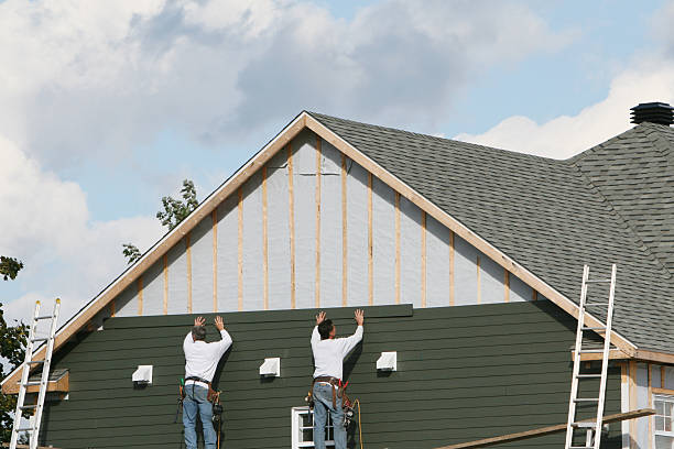 Professional Storm Damage Siding Repair technician working in Franklinton, NC